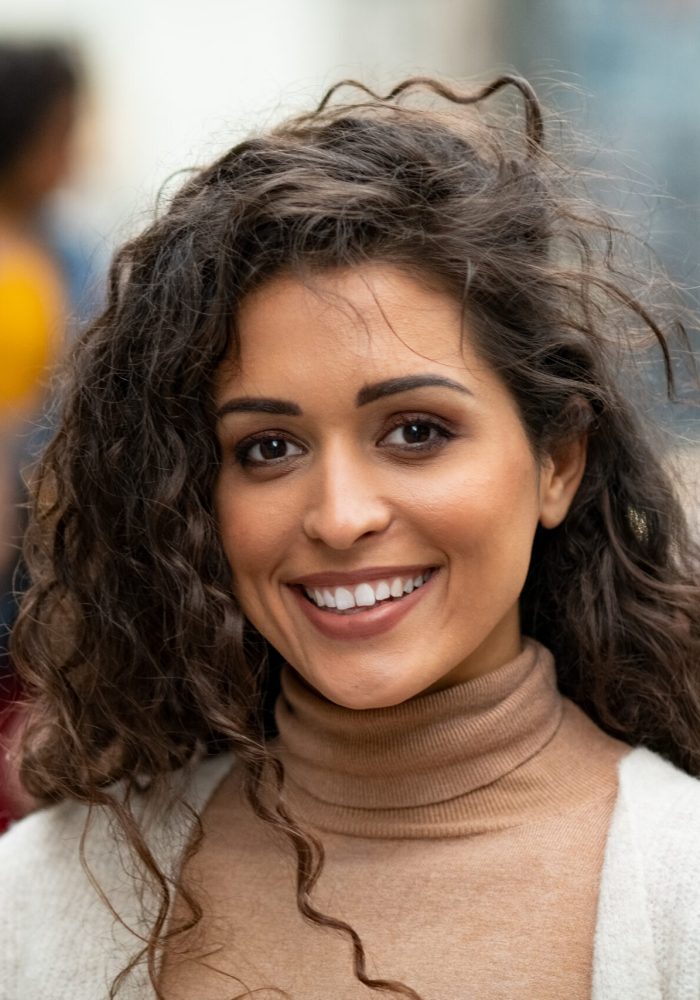 portrait-of-beautiful-latin-woman-standing-on-city-2025-10-03-16-07-14-utc